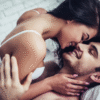 Couple having sex in bed